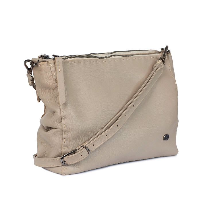 Beige handbag with a shoulder strap on a white background