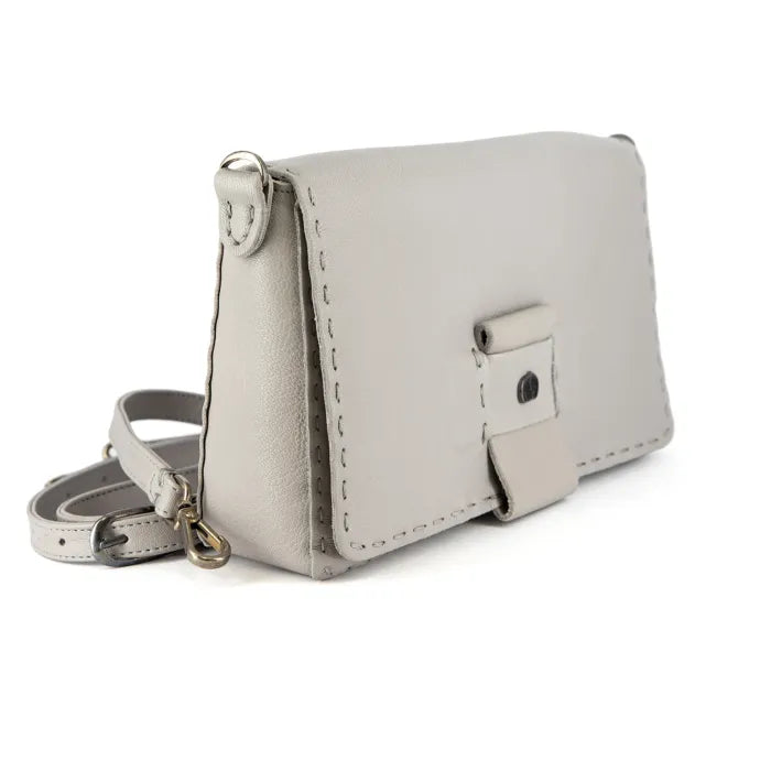 Light grey leather crossbody bag on a white background