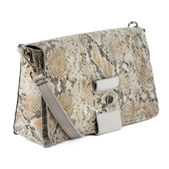 Snake print handbag with a light grey strap on a white background