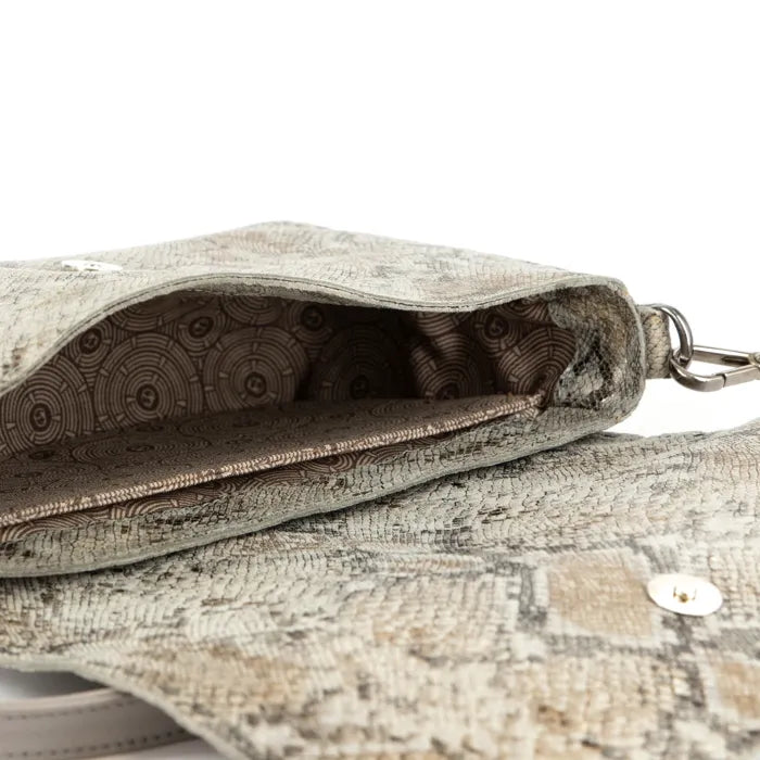 Textured fabric pouch with a zipper on a textured surface
