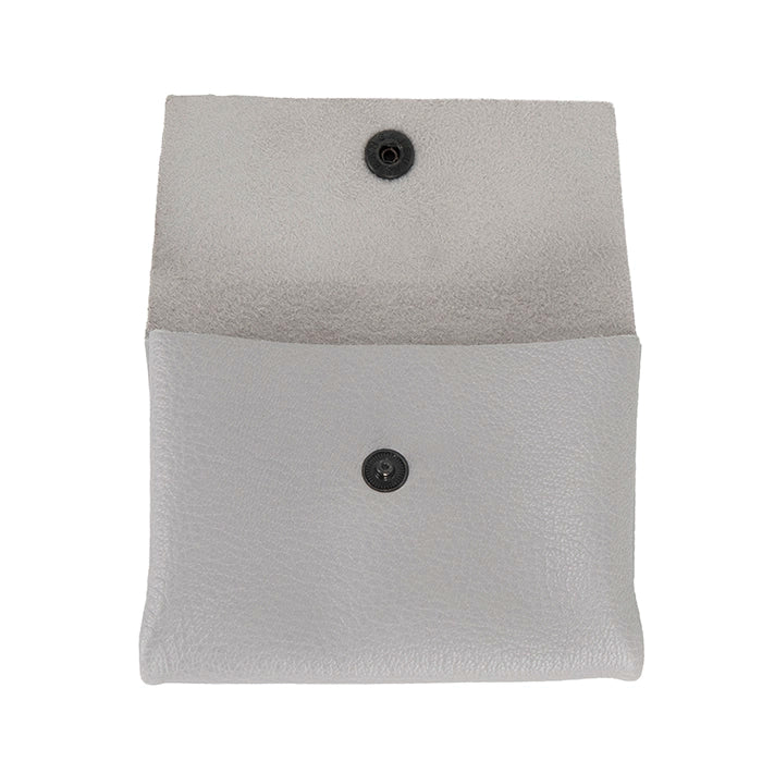 Grey pouch with black buttons on a white background