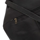 Close-up of a black leather bag with a gold zipper on a white background