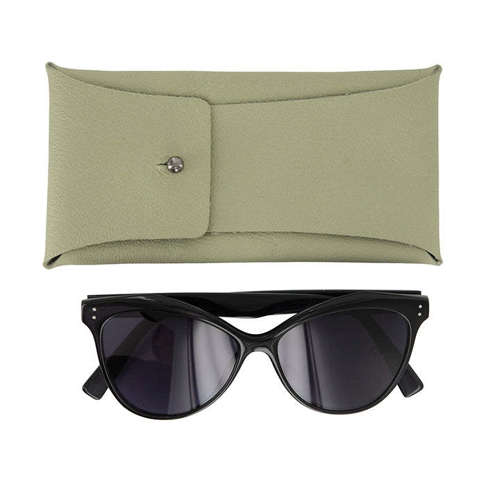 Black sunglasses placed next to a light sage green textured leather case featuring a button closure.