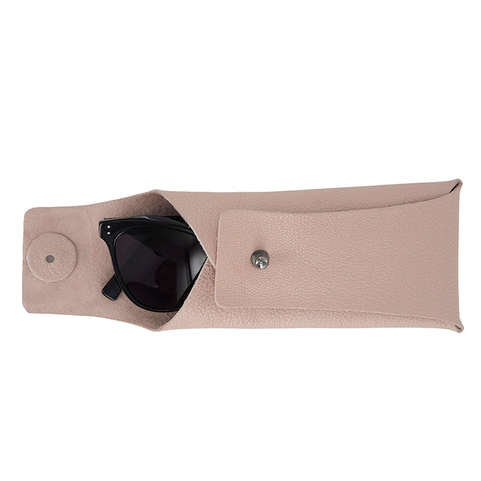 Pink sunglasses case with a black sunglasses inside on a white background