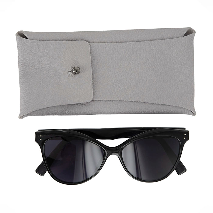 Black sunglasses placed next to a grey textured leather case featuring a button closure.