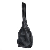 Black leather handbag on a white background