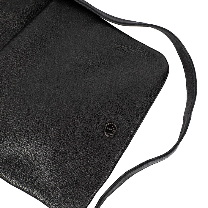 Black leather crossbody bag with a strap on a white background