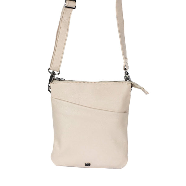 Beige crossbody bag on a white background