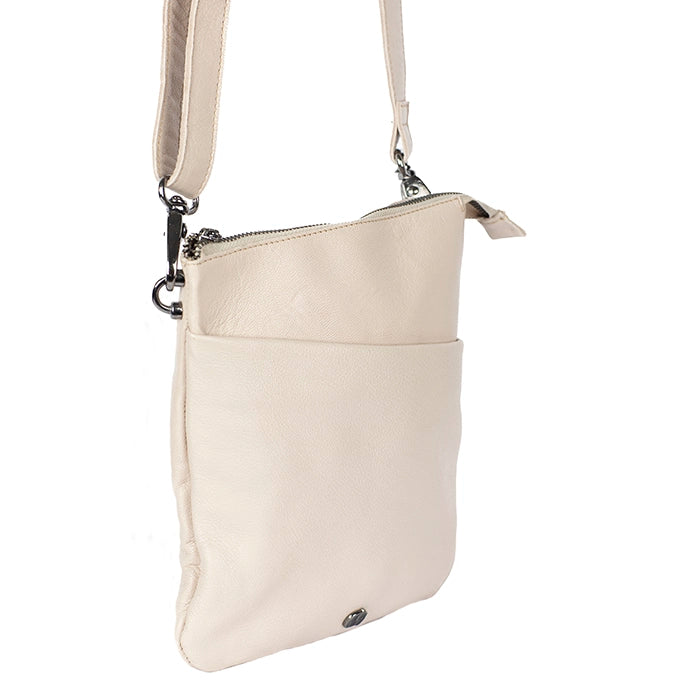 Beige crossbody bag on a white background