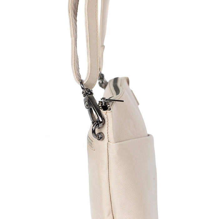 Beige handbag with a strap on a white background