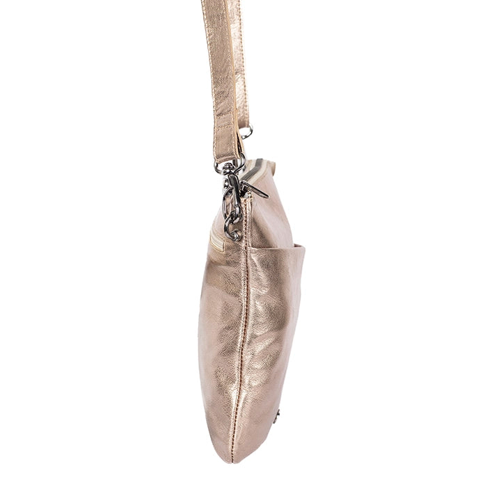Metallic gold side view of a cross body bag on a white background