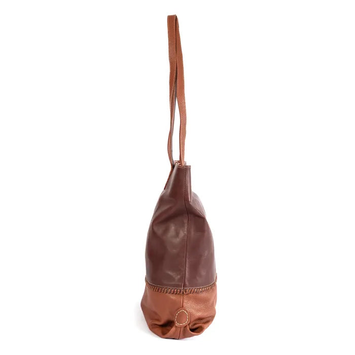 Maroon and Brown leather handbag with a strap on a white background