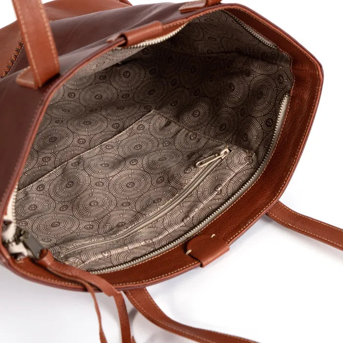 Maroon and Brown leather handbag with patterned interior on a white background