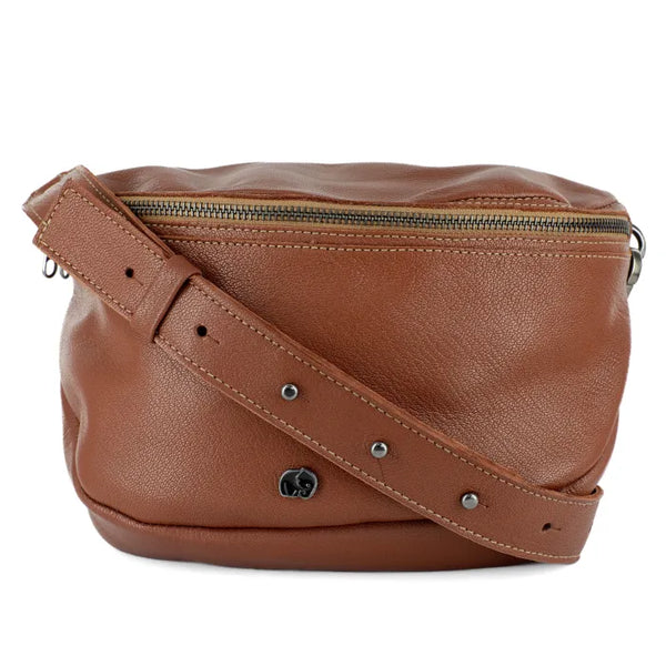 Brown leather bag with a strap on a white background