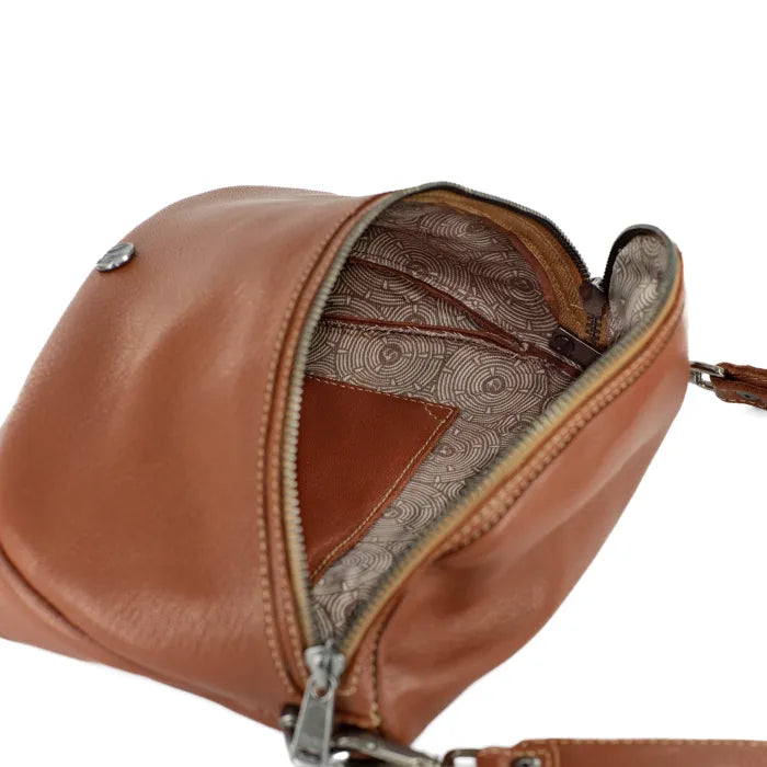 Brown leather bag with open front, showing interior patterned lining.