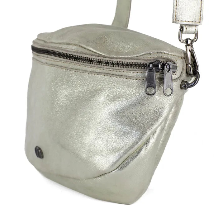 Silver metallic crossbody bag on a white background